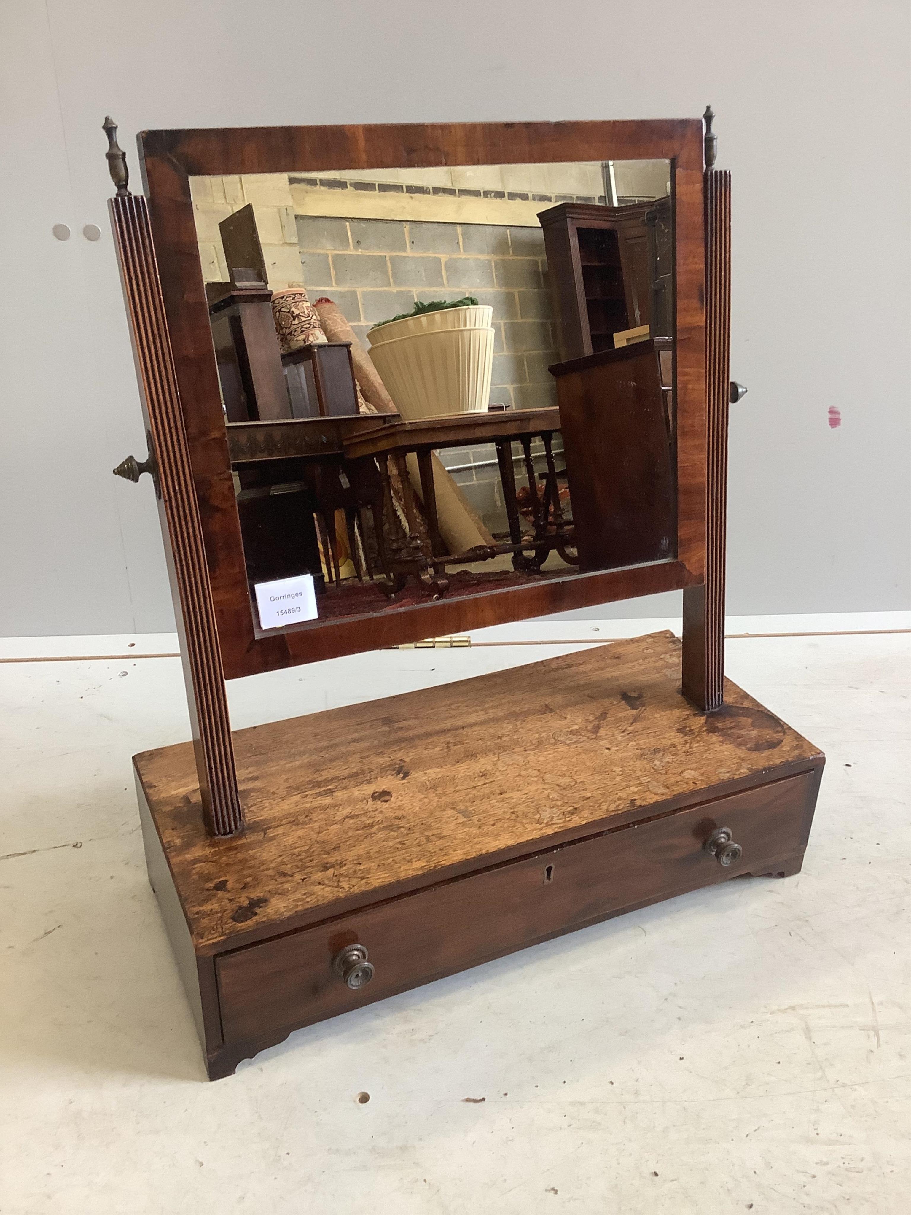 A George III mahogany toilet mirror, width 51cm, depth 23cm, height 59cm. Condition - fair